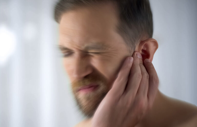 Man with hearing problem